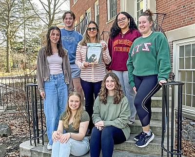 Pictured are, back row clockwise from left, Katie Gruver '26, Luz Peguero '26, Mirta Suquet, assistant professor of Spanish studies; Maso...